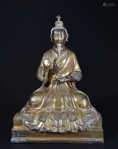 A GILT-BRONZE FIGURE OF BUDDHA