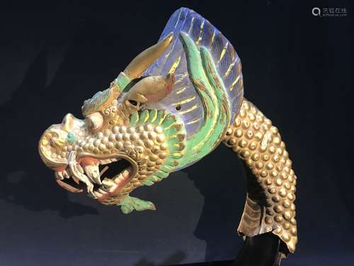 A GILT AND COLOR DECORATED FIGURE OF DRAGON HEAD