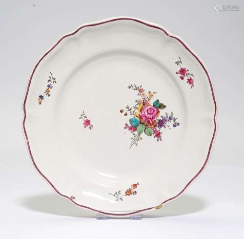 FAIENCE PLATE DECORATED WITH FLOWERS,