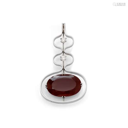 GARNET, DIAMOND AND GOLD PENDANT, ca. 1973.