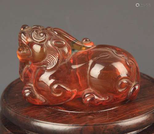 A FINE OPTIMIZE AMBER ANIMAL STATUE