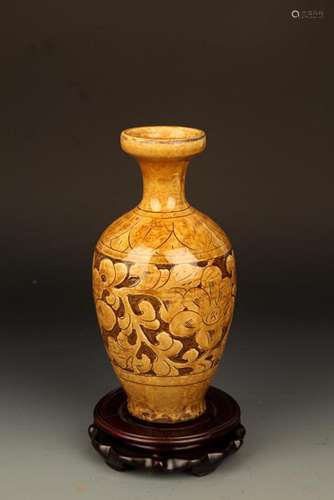 A YELLOW GLAZED FLOWER CARVING PORCELAIN BOTTLE