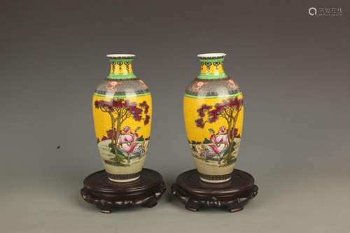 PAIR OF YELLOW GROUND STORY PORCELAIN VASE