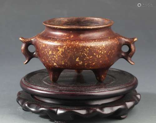 A REAR TRIPOD BRONZE WITH SPILLED GOLD CENSER