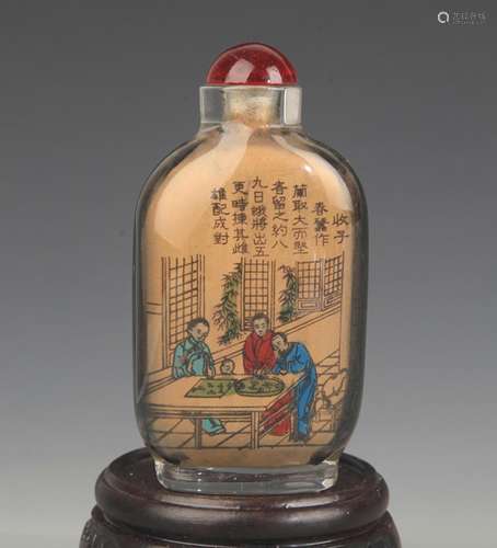 A CHARACTER PAINTED GLASS SNUFF BOTTLE