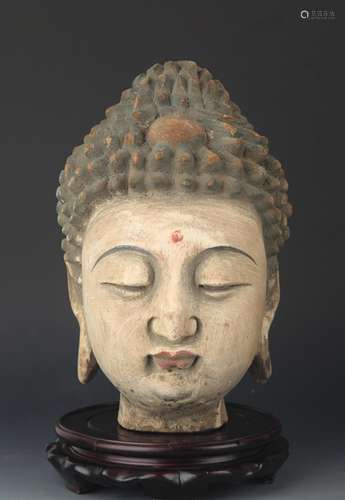 A CARVED AND PAINTED AKSHOBHYA BUDDHA HEAD