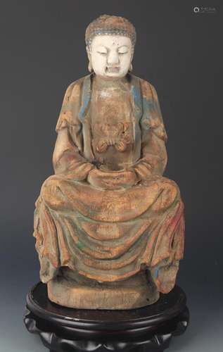 A FINE CARVED AND PAINTED BHAISAJYAGURU BUDDHA