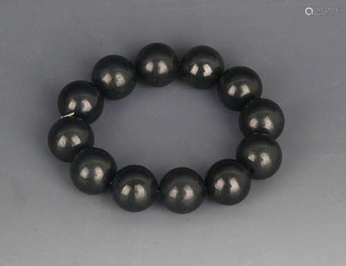 A OBSIDIAN STONE BRACELETS