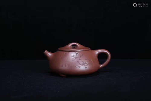 A JINGZHOU PURPLE CLAY TEAPOT