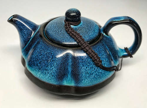 A JUN KLIN GLAZED BLUE TEAPOT