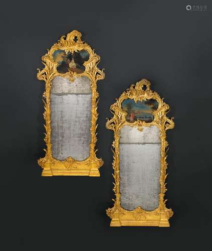 PAIR OF NARROW TRUMEAU MIRRORS,