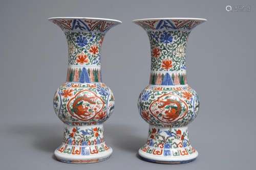 A pair of Chinese wucai gu vases with dragons, Wanli mark, Republic, 20th C.