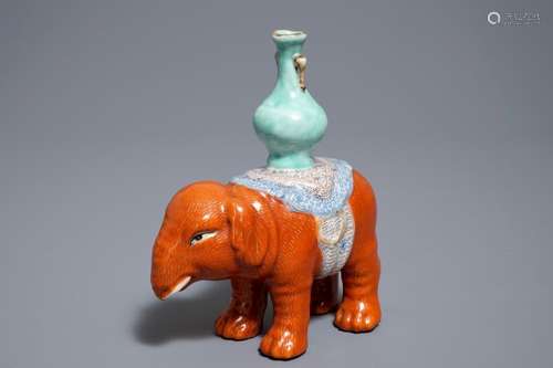 A Chinese famille rose elephant joss stick holder, 19th C.