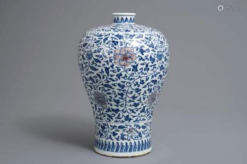 A Chinese blue, white and underglaze red 'lotus scroll' meiping vase, 19/20th C.