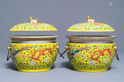 A pair of Chinese famille jaune tureens and covers with dragons and phoenixes, 19th C.