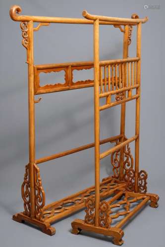 Two Chinese wooden textile hangers, 20th C.