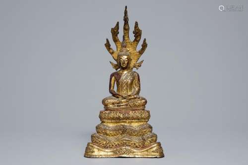 An inlaid gilt-lacquered bronze figure of Buddha, Burma, 19th C.