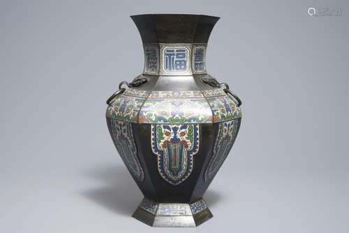 An archaic Chinese bronze and champlevé enamel vase, 19th C.