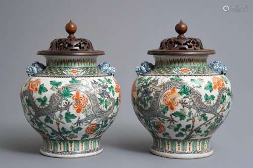 A pair of Chinese famille verte 'dragon' vases, 19/20th C.