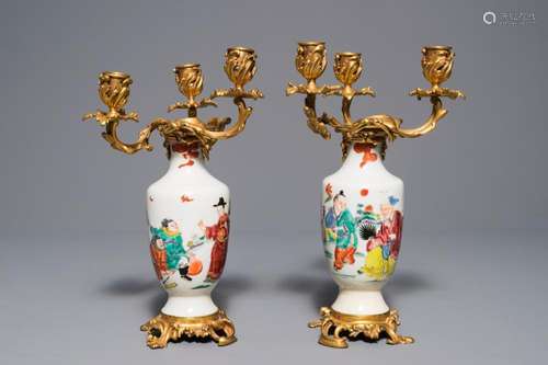 A pair of Chinese gilt bronze candelabra-mounted famille rose vases, Yongzheng