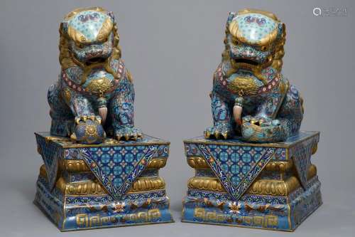 A pair of large Chinese cloisonné buddhist lions, 19/20th C.