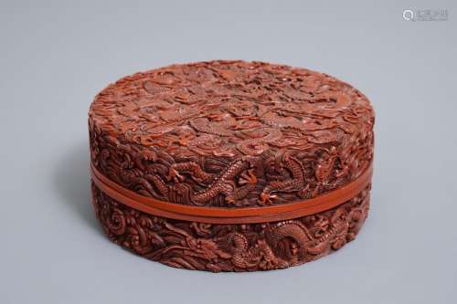 A Chinese cinnabar lacquer 'dragon' box and cover, Qianlong and Jiu Long Bao He marks, 19/20th C.
