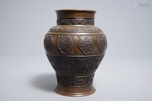 A Sino-Tibetan bronze vase with applied design of mythical beasts, 18/19th C.