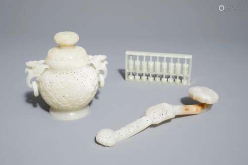A Chinese reticulated jade incense burner, a ruyi scepter and an abacus, 19/20th C.
