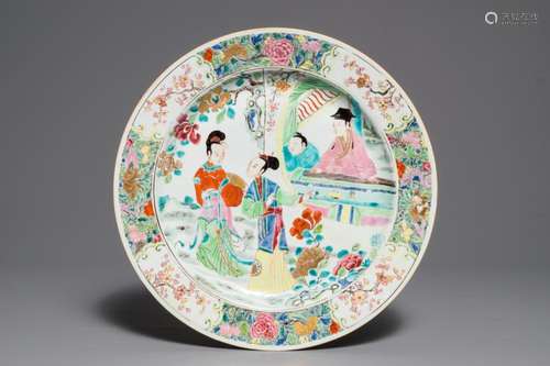 A fine Chinese famille rose dish with figures in a garden, Yongzheng