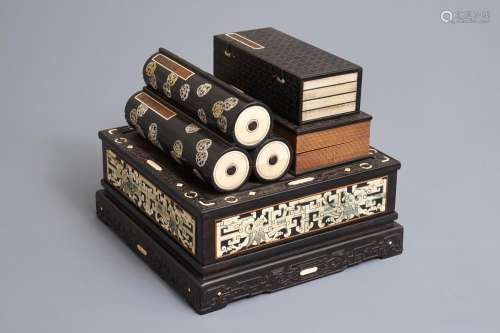 A Chinese bone and mother of pearl inlaid wooden box with multiple compartments, 19th C.