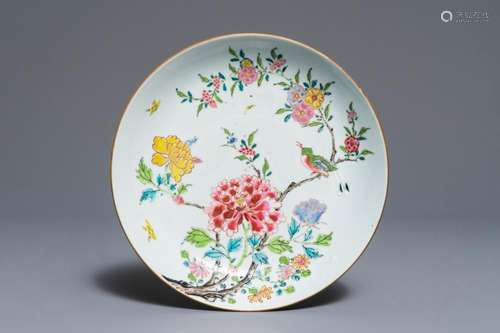 A fine Chinese famille rose plate with a bird among flowers, Yongzheng