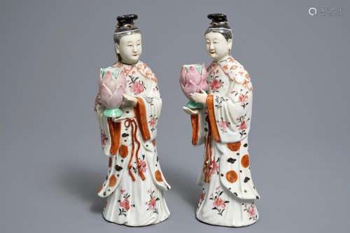 A pair of Chinese famille rose candle holders shaped as court ladies, Qianlong