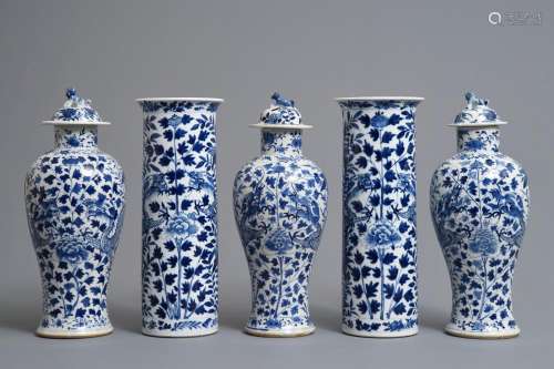 A Chinese blue and white five-piece garniture with dragons, Kangxi marks, 19th C.