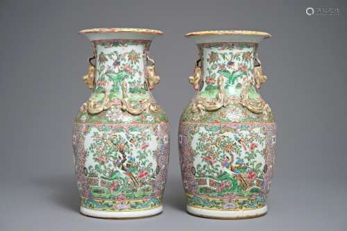 A pair of Chinese pink-ground Canton vases, 19th C.