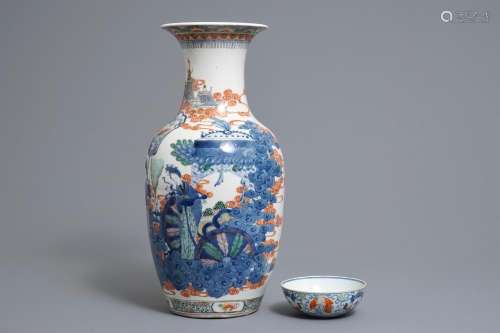 A Chinese famille verte vase and a famille rose bowl, 19th C.