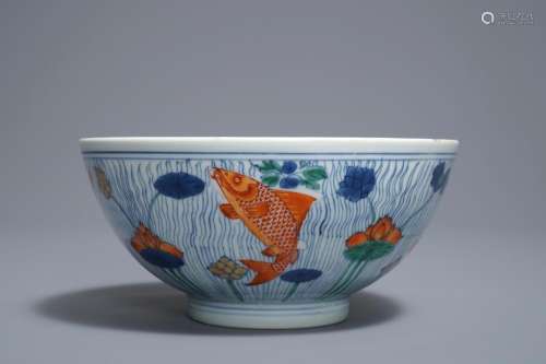 A Chinese doucai bowl with fish in a lotus pond, Xuande mark, Kangxi