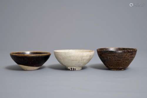 Three Chinese black-, brown- and cream-glazed bowls, Song and later