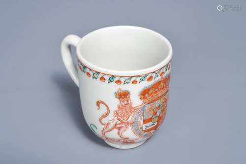 A Dutch-decorated Chinese cup and saucer with the royal Dutch arms of Oranje-Nassau, dated 1747, Qianlong