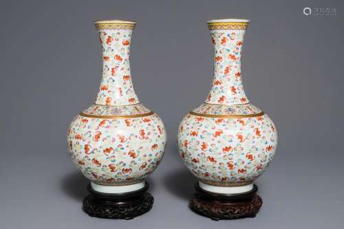 A pair of Chinese famille rose 'Hundred bats' vases, Guangxu mark and of the period