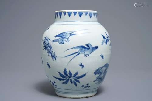 A Chinese blue and white jar with birds and flowers, Transitional period