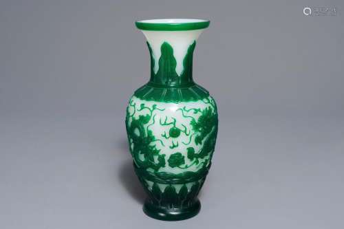 A Chinese green on white Peking glass dragon vase, Qianlong mark, 19th C.