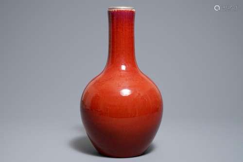 A Chinese monochrome oxblood-glazed bottle vase, 19th C.