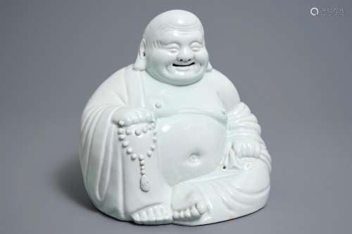 A Chinese blanc de Chine model of Buddha, impressed mark, 19/20th C.