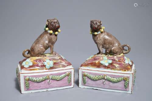 A pair of polychrome Tournai faience pugs, 18th C.