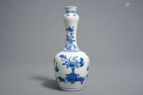 A Chinese blue and white bottle vase with 'antiquities' design, Kangxi