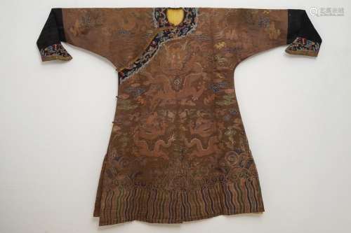 A Chinese brown ground eight-dragon embroidered silk robe, Qianlong