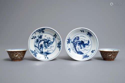 A pair of Chinese capucin-ground cups and saucers with European wheel engraved design, Kangxi