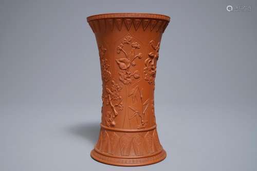 A Chinese Yixing stoneware beaker vase with applied floral design, Kangxi