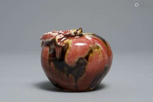 A Chinese flambé-glazed brushwasher with applied dragon, 18/19th C.