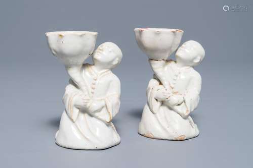 A pair of white-glazed salts in the shape of Chinamen, prob. Brussels, 18th C.